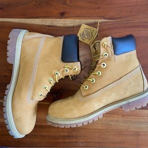 Tan Timberlands mid top boots